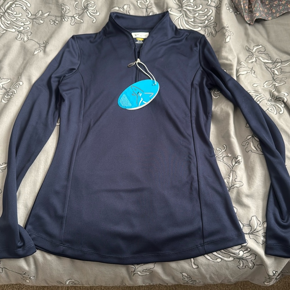 Brand new Greg Norman golf top xs